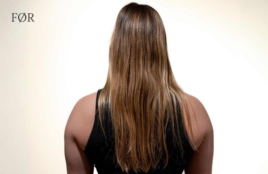 Kvinde med langt brunt hår før brug af ZENZ Organic hårprodukter. Hendes hår ser usundt og rodet ud.